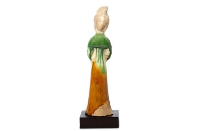 Lot 78 - A CHINESE SANCAI-GLAZED POTTERY FIGURE OF A...
