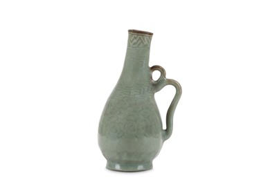 Lot 237 - A CHINESE CELADON EWER. With a pear-shaped...