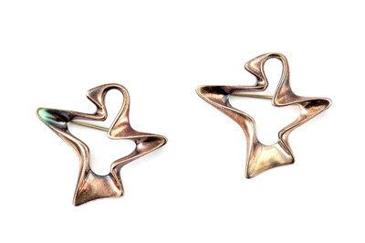 Lot 411 - A pair of 'Designer of the Year 2000' brooches,...