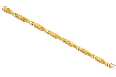 Lot 101 - A diamond-set alligator bracelet, by B....