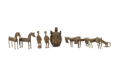 Lot 858 - A quantity of African cast bronzes in Benin...