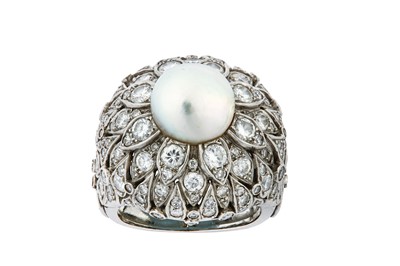 Lot 32 - A natural pearl and diamond dress ring  The 10....