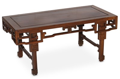 Lot 427 - A CHINESE WOOD LOW TABLE. Late Qing Dynasty....