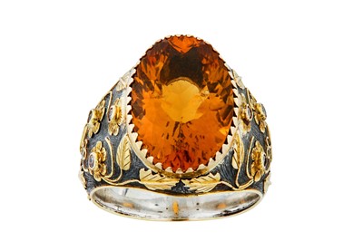 Lot 102 - A citrine and diamond dress ring The oval...