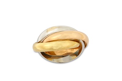 Lot 179 - A 'Trinity' ring by Cartier Designed as three...