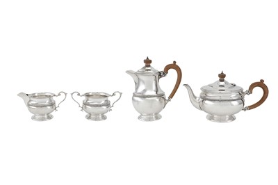 Lot 211 - A George VI sterling silver four-piece tea...