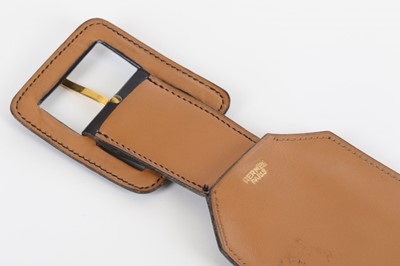 Lot 470 - Two Vintage Hermes Belts, to include a black...