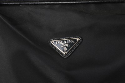 Lot 122 - Prada Black Nylon and Leather Wheeled Suitcase,...