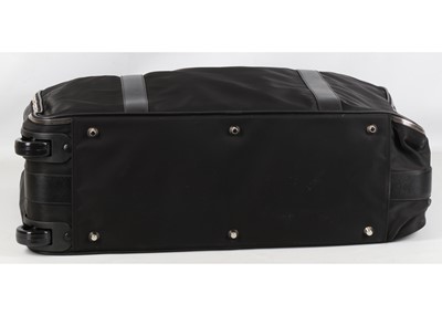 Lot 122 - Prada Black Nylon and Leather Wheeled Suitcase,...