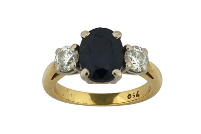 Lot 89 - A sapphire and diamond three-stone ring The...