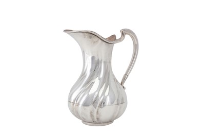 Lot 196 - An early 20th century 900 standard silver jug,...