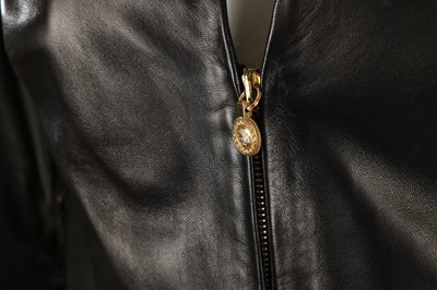 Lot 100 - Gianni Versace Black Leather and Python Skin...