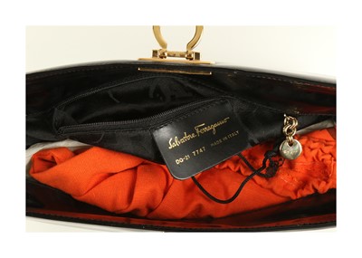 Lot 473 - Salvatore Ferragamo Black Patent Leather...