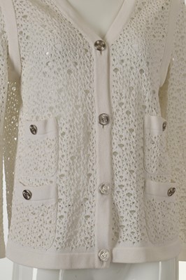 Lot 298 - Chanel White Crochet Cardigan, silver metal CC...