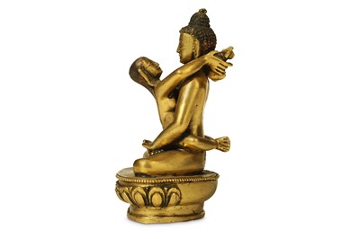 Lot 375 - A SINO-TIBETAN GILT-BRONZE FIGURE OF...