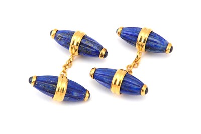 Lot 404 - A pair of lapis and sapphire cufflinks,...