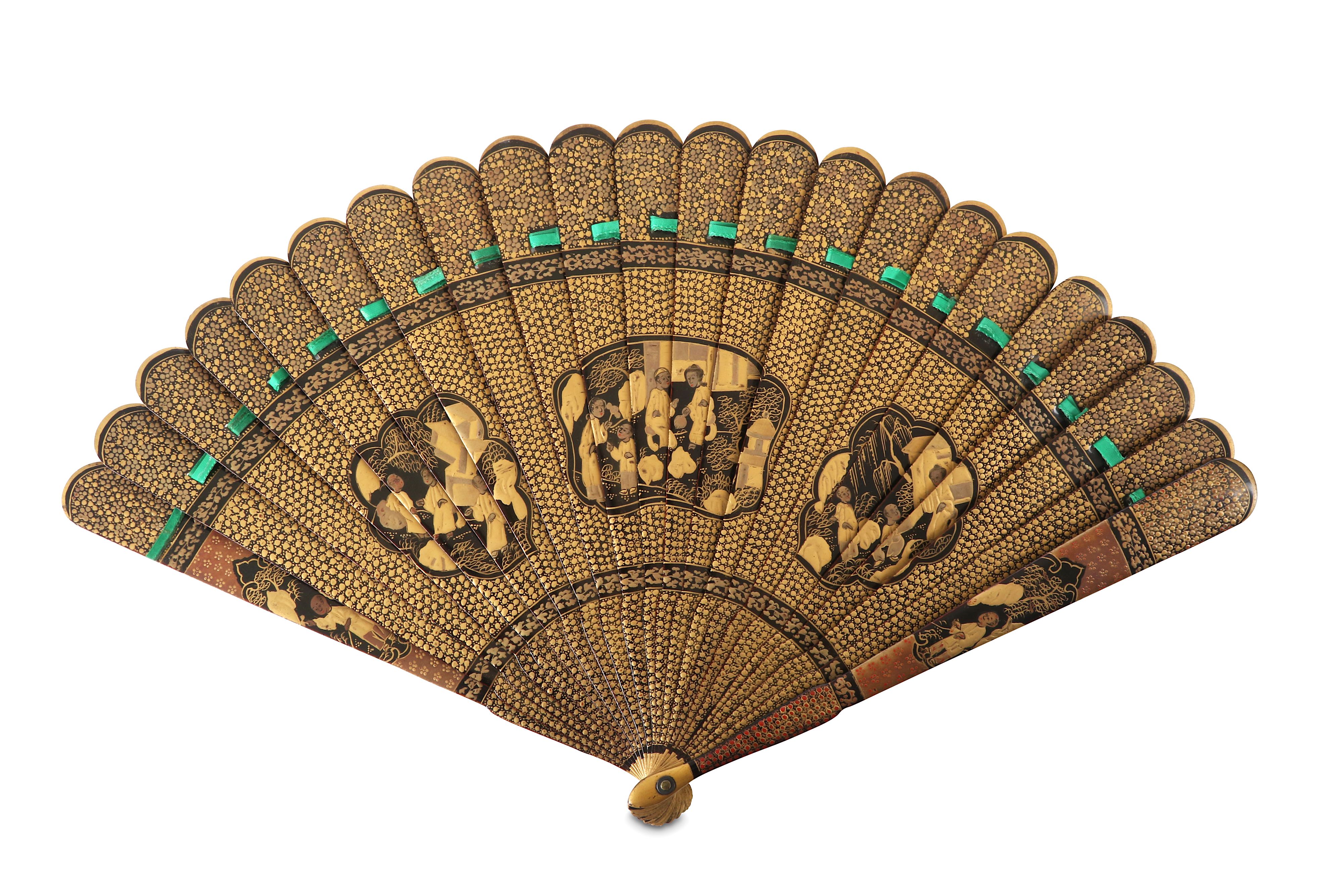 Lacquer Fan Pattern Lot 73 - A CHINESE GILT-DECORATED BLACK LACQUER FAN.