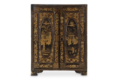 Lot 74 - A CHINESE GILT-DECORATED BLACK LACQUER CABINET....