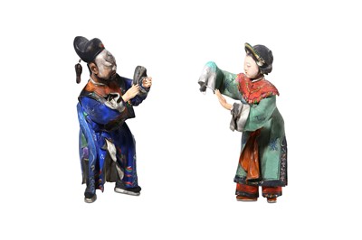 Lot 268 - A PAIR OF CHINESE PAINTED CLAY FIGURES. Qing...