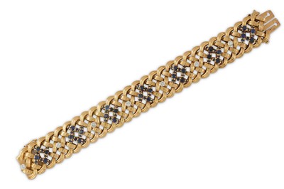 Lot 86 - A diamond and sapphire bracelet Of woven...