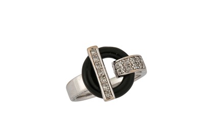 Lot 183 - An onyx and diamond ring, by Guy Laroche Of...