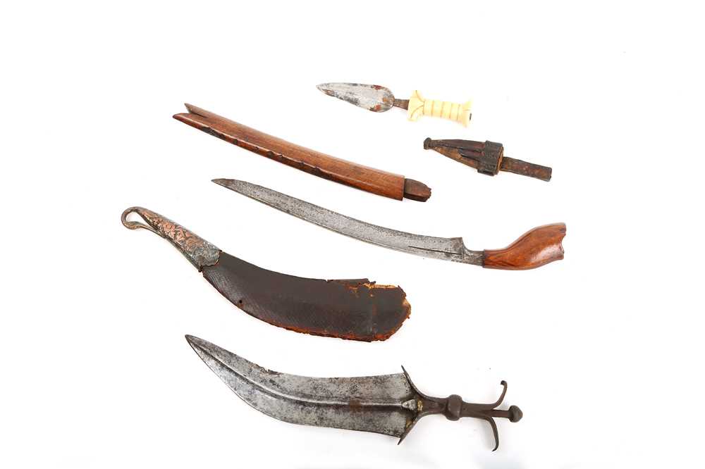 Lot 64 - Three ethnic daggers, a 19th century sewar (or...