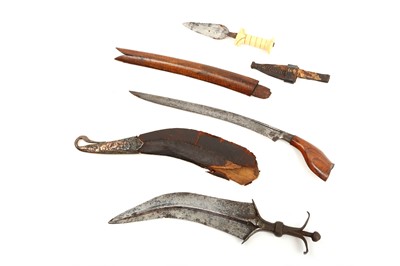 Lot 64 - Three ethnic daggers, a 19th century sewar (or...