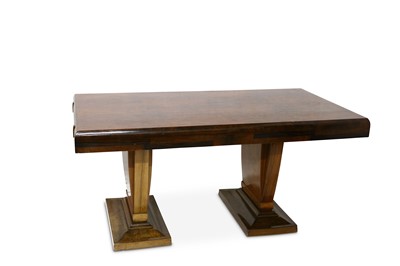 Lot 680 - An Art Deco walnut dining table, the...