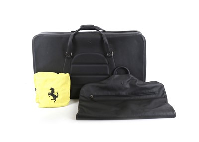 Lot 519 - Two Pieces of Ferrari Schedoni Black Leather...