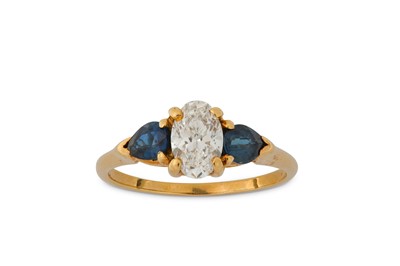 Lot 169 - A sapphire and diamond three-stone ring The...