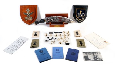 Lot 27 - An assemblage of military items relating to...