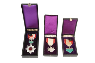 Lot 18 - Three Japanese medals, of the Order of the...