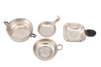 Lot 315 - A collection of silver tea strainers,...