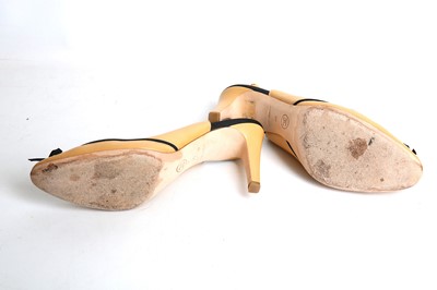 Lot 464 - Chanel Tan Leather Slingbacks, black ribbon...