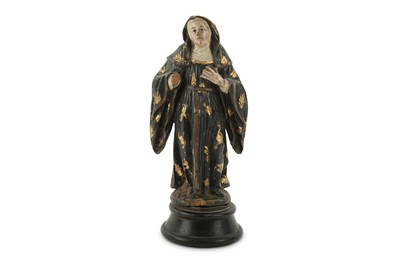 Lot 562 - An 18th century Spanish Colonial carved and...