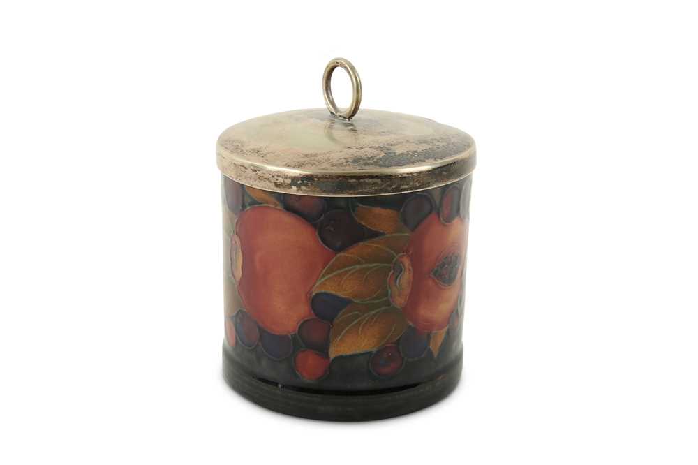 Lot 532 - A Moorcroft Pomegranate and berries jam pot,...