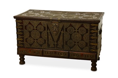 Lot 57 - A TEAK AND BRASS STUDDED ZANZIBAR CHEST. With...