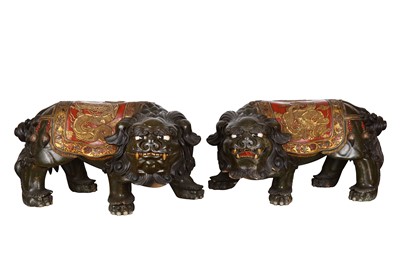 Lot 192 - A PAIR OF LARGE JAPANESE LACQUERED WOOD LION...