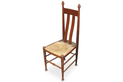 Lot 716 - An Arts & Crafts rush seated oak side chair,...