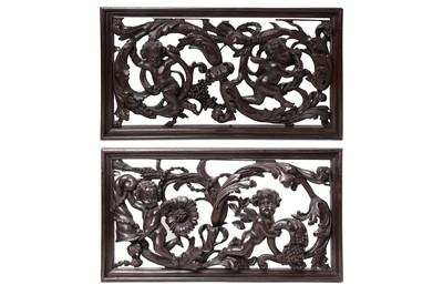 Lot 101 - A PAIR OF CARVED WOODEN PANELS. Mid-19th...