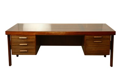 Lot 722 - A 1960s rosewood 'Presidents' desk designed by...