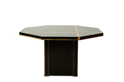 Lot 723 - A 1980s black lacquered and brass inlaid table...