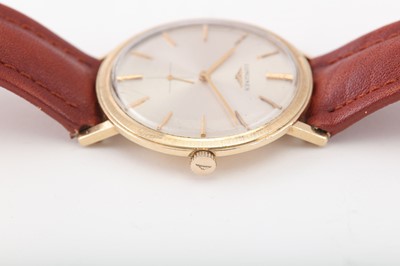 Lot 294 - LONGINES. A GENTS 14K YELLOW GOLD MANUAL WIND...