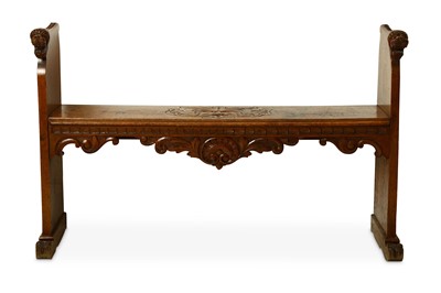 Lot 95 - A VICTORIAN OAK HALL BENCH. The twin ends...