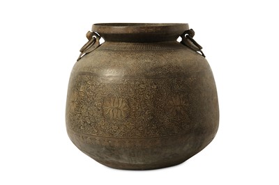 Lot 54 - A MONUMENTAL INCISED COPPER JAR. Iran or India,...