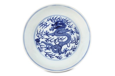 Lot 289 - A CHINESE BLUE AND WHITE ‘DRAGON’ DISH. Qing...