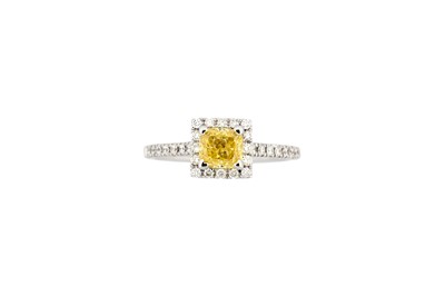 Lot 769 - A fancy-coloured diamond and diamond ring, set...