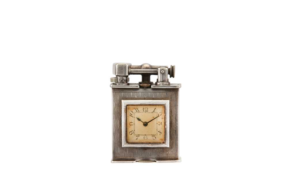 Lot 205 - BEACON. A SILVER LIGHTER WATCH. Date: Circa...