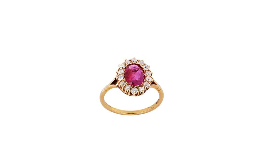 Lot 44 - A ruby and diamond cluster ring The...