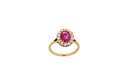 Lot 44 - A ruby and diamond cluster ring The...